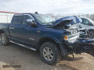 2021 Ram 2500 Laramie with VIN 3C6UR5FJ2MG668959, listed as a IAAI auction lot 42066247 with 14,739 mi miles. Bid and sale history available at carsss.com. Image 1.