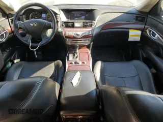 2018 Infiniti Q70 Luxe with VIN JN1BY1PR6JM370328, listed as a Copart auction lot 77170614 with 118,732 mi miles and Salvage title. Bid and sale history available at DreamBid. Image 8.