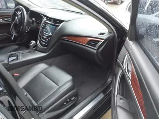2014 Cadillac CTS Luxury AWD with VIN 1G6AX5SX3E0156938, listed as a IAAI auction lot 41574318 with 151,585 mi miles and . Bid and sale history available at DreamBid. Image 5.