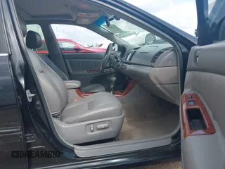 2005 Toyota Camry LE with VIN 4T1BF32K15U091945, listed as a IAAI auction lot 42124503 with 212,951 mi miles and . Bid and sale history available at DreamBid. Image 5.