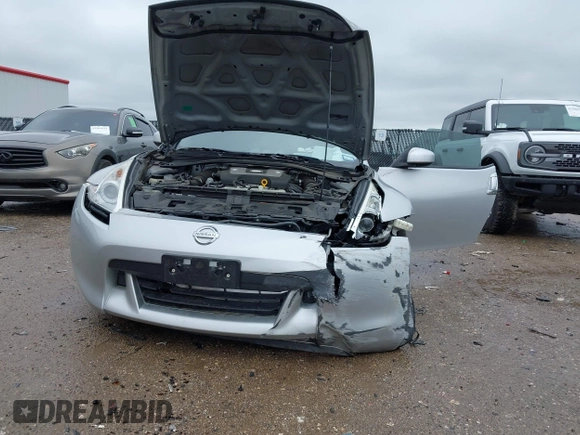 2010 Nissan 370Z Touring with VIN JN1AZ4EH9AM503264, listed as a IAAI auction lot 42180901 with Not provided miles and . Bid and sale history available at DreamBid. Image 6.