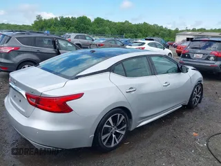 2016 Nissan Maxima SV with VIN 1N4AA6AP5GC900892, listed as a IAAI auction lot 42139043 with 325,228 mi miles and . Bid and sale history available at carsss.com. Image 4.