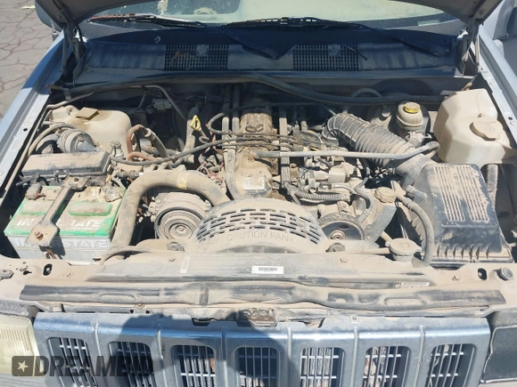 1997 Jeep Grand Cherokee Laredo z VIN 1J4GZ58S4VC720943, wystawiony jako IAAI lot #42648807 z przebiegiem 231 203 mil mil oraz . Historia ofert i sprzedaży dostępna na DreamBid. Obrazek 10.