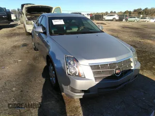 2009 Cadillac CTS AWD w/1SA with VIN 1G6DG577990113457, listed as a IAAI auction lot 38002705 with 101,298 mi miles. Bid and sale history available at carsss.com. Image 6.
