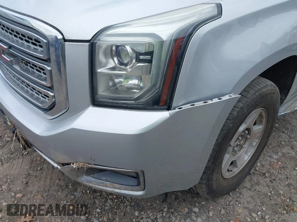 2015 GMC Yukon SLE with VIN 1GKS1AKC8FR201818, listed as a IAAI auction lot 41707754 with 193,100 mi miles. Bid and sale history available at carsss.com. Image 17.