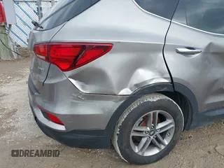 2017 Hyundai Santa Fe 2.4L with VIN 5XYZU3LB4HG424734, listed as a IAAI auction lot 41491166 with 130,905 mi miles and . Bid and sale history available at DreamBid. Image 6.