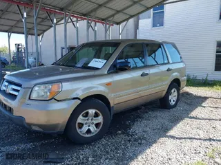 2006 Honda Pilot LX with VIN 2HKYF18146H551600, listed as a IAAI auction lot 39842919 with 133,188 mi miles. Bid and sale history available at carsss.com. Image 2.