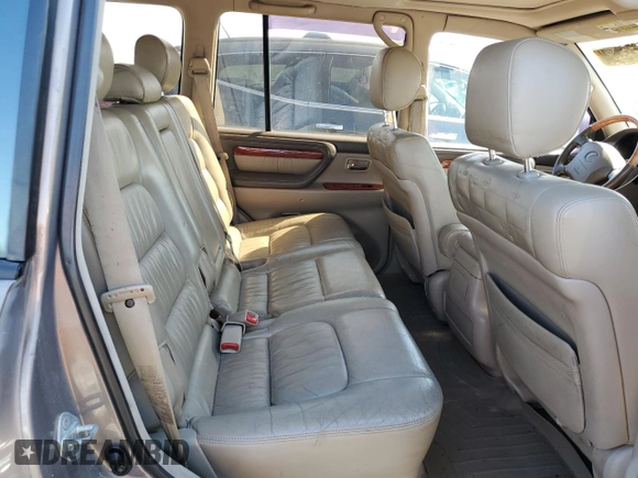 2000 Lexus LX 470 z VIN JT6HT00W9Y0120042, wystawiony jako Copart lot #49644355 z przebiegiem 188 992 mil mil oraz Czysty tytuł • Clean title. Historia ofert i sprzedaży dostępna na DreamBid. Obrazek 11.
