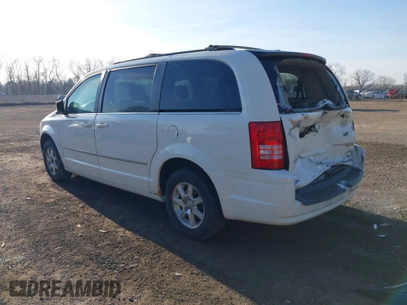 2009 Chrysler Town & Country Touring with VIN 2A8HR54179R631851, listed as a IAAI auction lot 41786165 with 126,988 mi miles and . Bid and sale history available at DreamBid. Image 3.