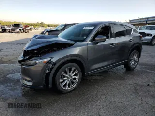 2019 Mazda CX-5 Grand Touring with VIN JM3KFBDM9K0676795, listed as a Copart auction lot 52129885 with 71,869 mi miles and Salvage Title. Bid and sale history available at carsss.com. Image 1.