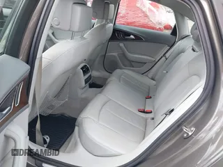 2013 Audi A6 Premium Plus z VIN WAUGGAFC1DN038375, wystawiony jako IAAI lot #42051929 z przebiegiem 118 181 mil mil oraz . Historia ofert i sprzedaży dostępna na DreamBid. Obrazek 8.