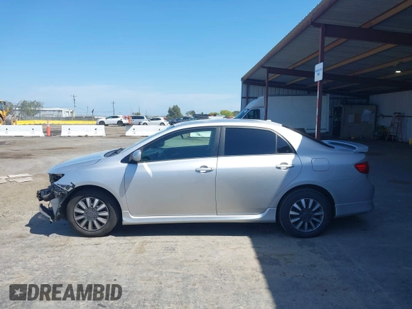 2009 Toyota Corolla with VIN 1NXBU40E99Z105346, listed as a IAAI auction lot 42062757 with 130,968 mi miles. Bid and sale history available at carsss.com. Image 14.