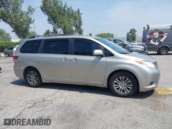 2015 Toyota Sienna XLE with VIN 5TDYK3DC4FS560743, listed as a IAAI auction lot 42488745 with 145,009 mi miles and . Bid and sale history available at DreamBid. Image 13.