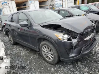 2014 Mazda CX-5 Sport with VIN JM3KE4BE0E0428322, listed as a Copart auction lot 56012495 with 278,146 mi miles and Salvage title. Bid and sale history available at DreamBid. Image 4.