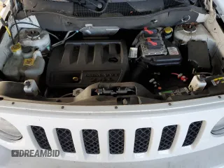 2014 Jeep Patriot Latitude with VIN 1C4NJRFB2ED665093, listed as a Copart auction lot 85868964 with 110,066 mi miles and Salvage title. Bid and sale history available at DreamBid. Image 12.