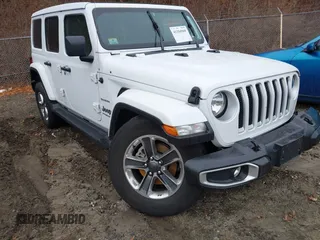 2021 Jeep Wrangler Unlimited Sahara z VIN 1C4HJXEG6MW751752, wystawiony jako IAAI lot #41104960 z przebiegiem 47 460 mil mil oraz . Historia ofert i sprzedaży dostępna na DreamBid. Obrazek 1.