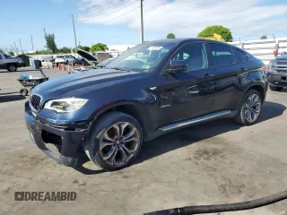 2013 BMW X6 xDrive35i z VIN 5UXFG2C50DL785065, wystawiony jako Copart lot #57036985 z przebiegiem 135 515 mil mil oraz Tytuł czysty. Historia ofert i sprzedaży dostępna na DreamBid. Obrazek 1.