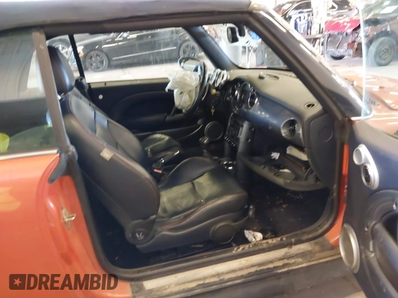 2005 MINI Convertible S with VIN WMWRH33455TK55035, listed as a IAAI auction lot 41936645 with 111,018 mi miles and . Bid and sale history available at DreamBid. Image 5.