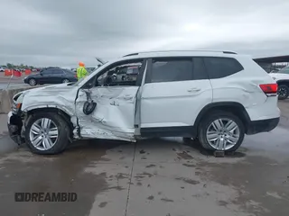2019 Volkswagen Atlas SE z VIN 1V2WR2CA9KC593891, wystawiony jako IAAI lot #41947078 z przebiegiem 74 525 mil mil oraz . Historia ofert i sprzedaży dostępna na DreamBid. Obrazek 15.
