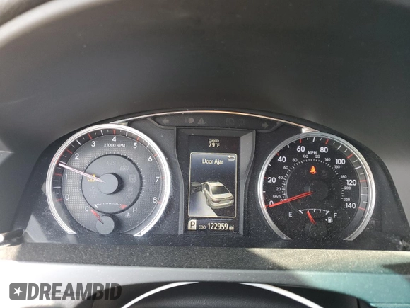 2015 Toyota Camry XLE with VIN 4T1BF1FK4FU019928, listed as a Copart auction lot 52983545 with 122,959 mi miles and Salvage Title. Bid and sale history available at carsss.com. Image 9.