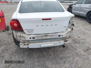 2013 Dodge Avenger SXT with VIN 1C3CDZCB9DN622189, listed as a IAAI auction lot 41937678 with 178,301 mi miles and . Bid and sale history available at carsss.com. Image 6.