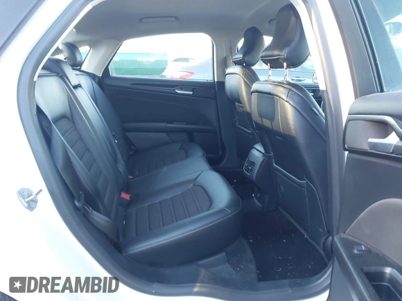 2018 Ford Fusion SE z VIN 3FA6P0H77JR108212, wystawiony jako IAAI lot #41208435 z przebiegiem 68 825 mil mil oraz . Historia ofert i sprzedaży dostępna na DreamBid. Obrazek 8.