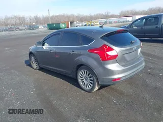 2012 Ford Focus Titanium with VIN 1FAHP3N28CL270225, listed as a IAAI auction lot 41401080 with 80,650 mi miles and . Bid and sale history available at carsss.com. Image 3.