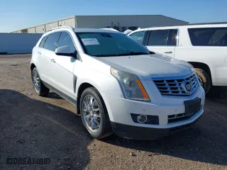 2015 Cadillac SRX Premium Collection with VIN 3GYFNDE35FS545581, listed as a IAAI auction lot 41154403 with 142,146 mi miles. Bid and sale history available at carsss.com. Image 1.