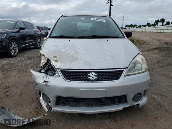 2006 Suzuki Aerio Premium z VIN JS2RC62H265351207, wystawiony jako Copart lot #74980534 z przebiegiem 64 199 mil mil oraz Nie do naprawy • Non repairable. Historia ofert i sprzedaży dostępna na DreamBid. Obrazek 5.