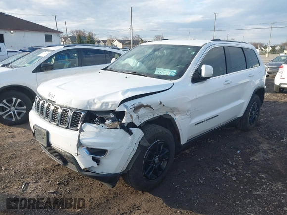 2018 Jeep Grand Cherokee Laredo E with VIN 1C4RJFAG6JC406061, listed as a IAAI auction lot 42046977 with 90,339 mi miles and . Bid and sale history available at DreamBid. Image 2.