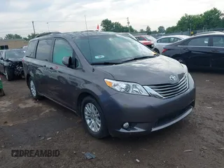 2014 Toyota Sienna XLE with VIN 5TDYK3DC0ES496716, listed as a IAAI auction lot 42494549 with 158,645 mi miles and . Bid and sale history available at DreamBid. Image 1.