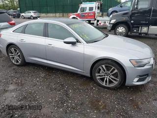 2023 Audi A6 Premium z VIN WAUD3BF27PN068058, wystawiony jako IAAI lot #42179522 z przebiegiem 7 869 mil mil oraz . Historia ofert i sprzedaży dostępna na DreamBid. Obrazek 1.