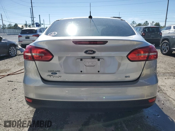 2017 Ford Focus SE with VIN 1FADP3F28HL338298, listed as a Copart auction lot 53458105 with 86,723 mi miles and Salvage Title. Bid and sale history available at carsss.com. Image 6.