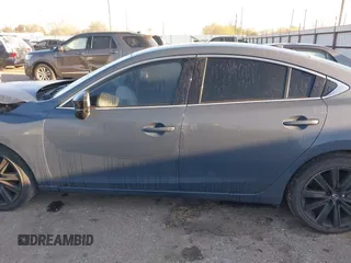 2021 Mazda 6 Carbon Edition with VIN JM1GL1WY9M1619981, listed as a IAAI auction lot 41751194 with 32,083 mi miles and . Bid and sale history available at DreamBid. Image 14.