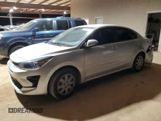 2023 Kia Rio S with VIN 3KPA24AD0PE603054, listed as a Copart auction lot 42997495 with 26,573 mi miles and Salvage Title. Bid and sale history available at carsss.com. Image 1.