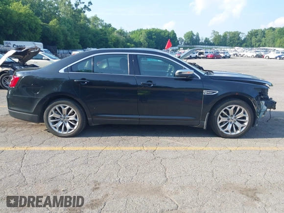 2014 Ford Taurus Limited with VIN 1FAHP2F86EG163392, listed as a IAAI auction lot 42538336 with 131,910 mi miles and . Bid and sale history available at DreamBid. Image 14.
