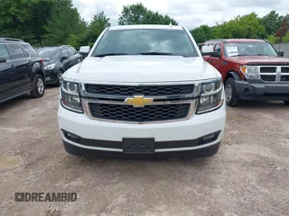2020 Chevrolet Tahoe LT with VIN 1GNSKBKC8LR108377, listed as a IAAI auction lot 42545775 with 90,425 mi miles and . Bid and sale history available at DreamBid. Image 12.