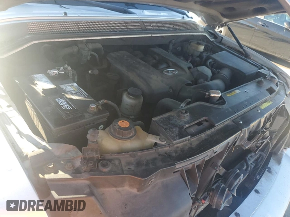 2006 Infiniti QX56 z VIN 5N3AA08A16N804708, wystawiony jako Copart lot #86788354 z przebiegiem 205 417 mil mil oraz Czysty tytuł • Clean title. Historia ofert i sprzedaży dostępna na DreamBid. Obrazek 11.