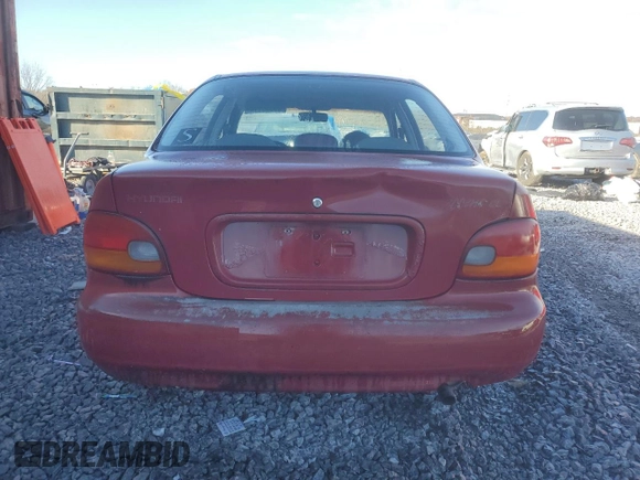 1997 Hyundai Accent с VIN KMHVF24N5VU369924, выставлен на аукционе Copart как лот 85036114 с пробегом 168 797 миль миль и Списание • Salvage title. История ставок и продаж доступна на DreamBid. Изображение 6.