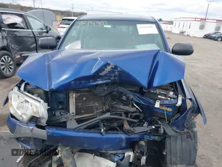 2014 Toyota Tacoma with VIN 3TMLU4EN0EM147243, listed as a IAAI auction lot 41684902 with 308,167 mi miles. Bid and sale history available at carsss.com. Image 11.