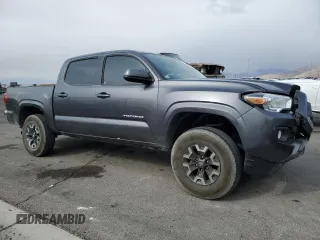 2021 Toyota Tacoma SR with VIN 3TYAX5GN7MT021255, listed as a Copart auction lot 42616935 with 64,626 mi miles and Salvage title. Bid and sale history available at DreamBid. Image 4.
