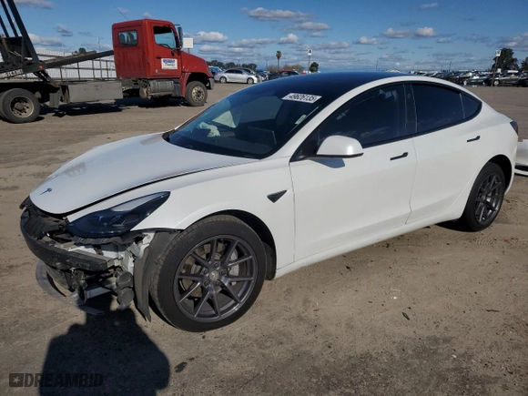 2021 Tesla Model 3 Standard Range Plus with VIN 5YJ3E1EA8MF074974, listed as a Copart auction lot 49626135 with 60,778 mi miles and Salvage Title. Bid and sale history available at carsss.com. Image 1.