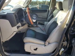 2007 Jeep Commander Overland with VIN 1J8HG68217C619277, listed as a Copart auction lot 82934414 with 136,282 mi miles and Salvage title. Bid and sale history available at DreamBid. Image 7.