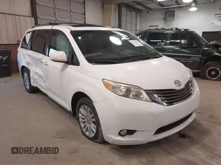 2011 Toyota Sienna XLE AAS with VIN 5TDYK3DC5BS130066, listed as a IAAI auction lot 41294340 with 156,591 mi miles. Bid and sale history available at carsss.com. Image 1.