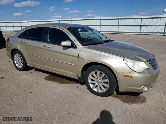 2010 Chrysler Sebring Limited with VIN 1C3CC5FD9AN162052, listed as a Copart auction lot 84756864 with 136,742 mi miles and Non Repairable. Bid and sale history available at carsss.com. Image 4.
