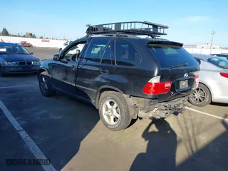 2005 BMW X5 3.0i with VIN 5UXFA13585LY10856, listed as a IAAI auction lot 41745279 with 153,748 mi miles. Bid and sale history available at carsss.com. Image 3.