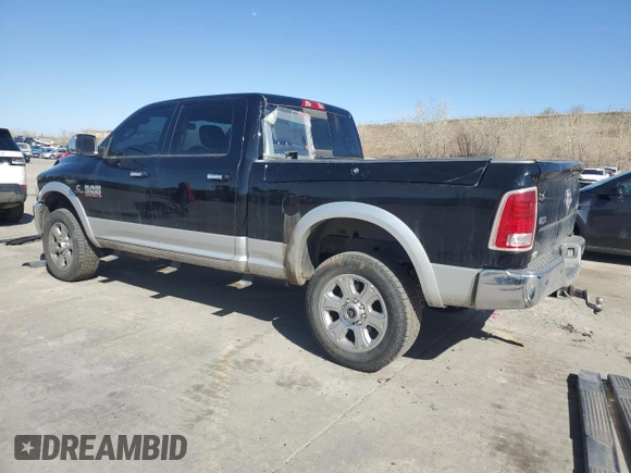 2014 Ram 2500 Laramie with VIN 3C6UR5FL2EG320582, listed as a Copart auction lot 52282625 with 216,745 mi miles and Salvage title. Bid and sale history available at DreamBid. Image 2.