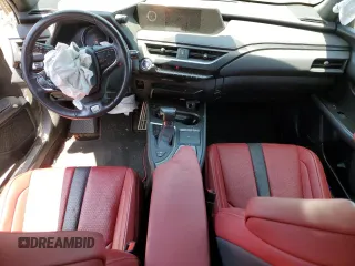 2019 Lexus UX 250h with VIN JTHU9JBH2K2013001, listed as a Copart auction lot 59142205 with 104,917 mi miles and Salvage title. Bid and sale history available at DreamBid. Image 8.