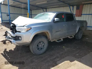 2022 Toyota Tacoma SR with VIN 3TMCZ5AN2NM470545, listed as a Copart auction lot 58419285 with 57,599 mi miles and Salvage title. Bid and sale history available at DreamBid. Image 1.