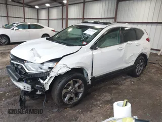2019 Honda CR-V EX with VIN 2HKRW2H56KH641449, listed as a IAAI auction lot 41762860 with 181,557 mi miles and . Bid and sale history available at DreamBid. Image 2.